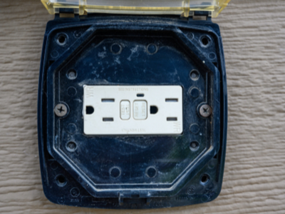 An outdoor GFCI outlet keeps you safe.