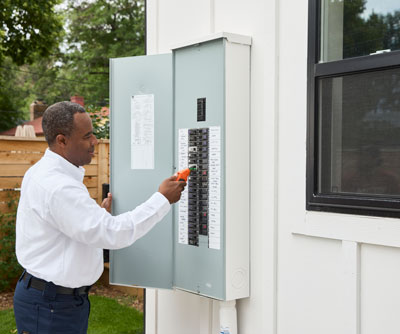 Man working on an Electrical Panel